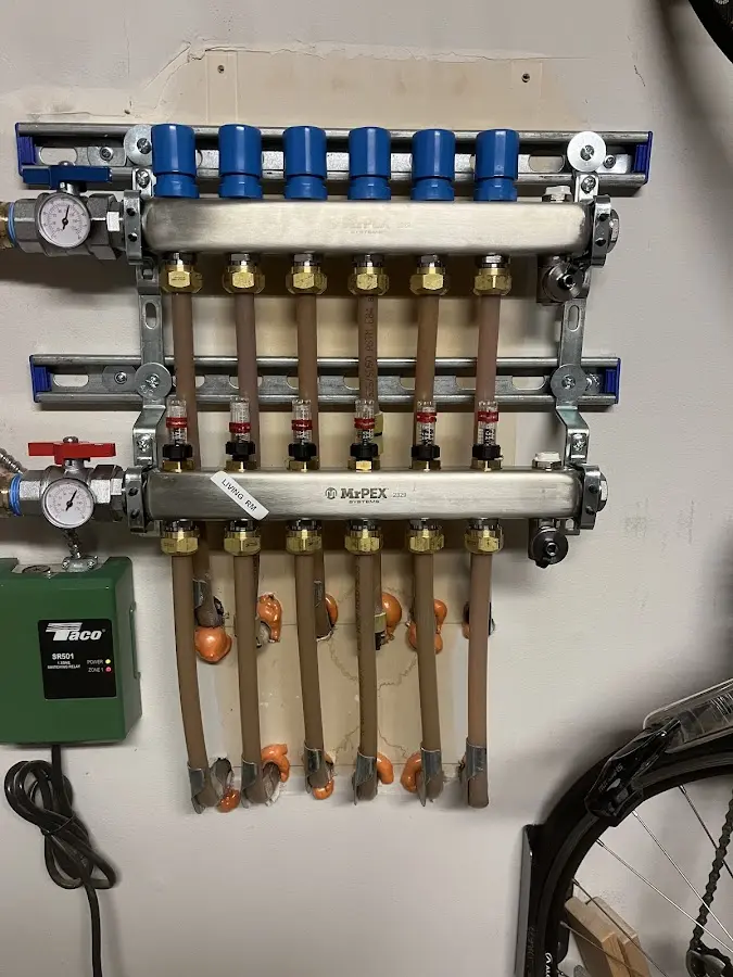 Plumber performing Water Heater Repair at a residential property in Fruitland